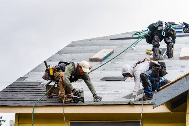 Professional Roofing technician working in North Falmouth, MA